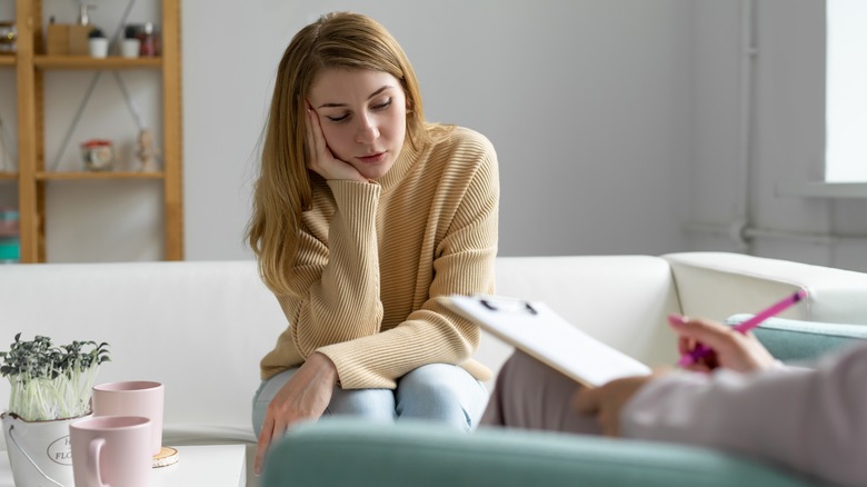 Woman talking with her therapist