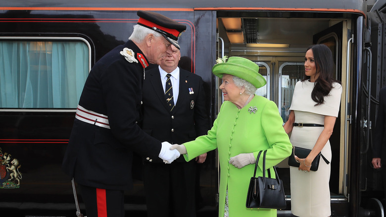 Elizabeth and Meghan exit royal train