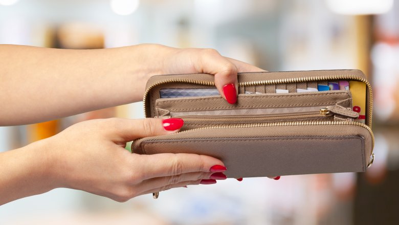 Woman holding wallet