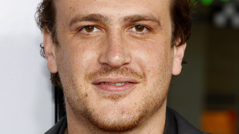 Jason Segel smiling at premiere of Forgetting Sarah Marshall 