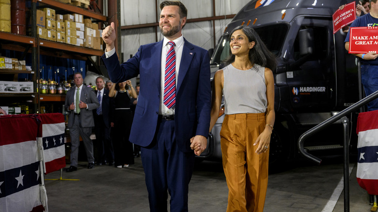 J.D. Vance and Usha Vance holding hands