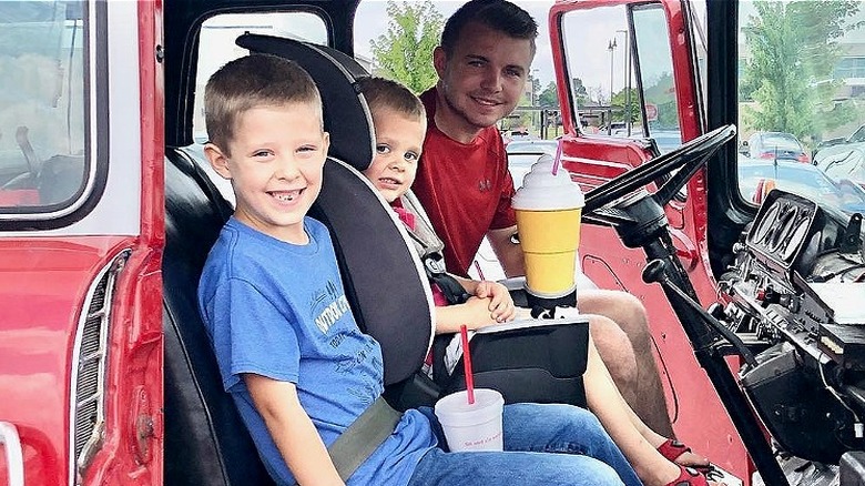 Samuel Dillard and Israel Dillard in James Duggar's fire truck