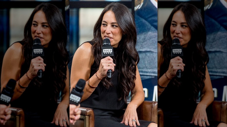 Joanna Gaines speaking, ring visible