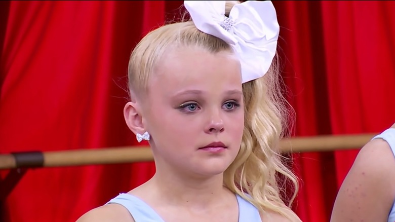 JoJo Siwa holding back tears