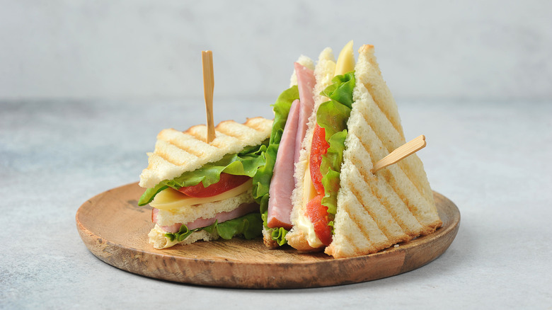 Sandwich with lettuce, tomato, cheese