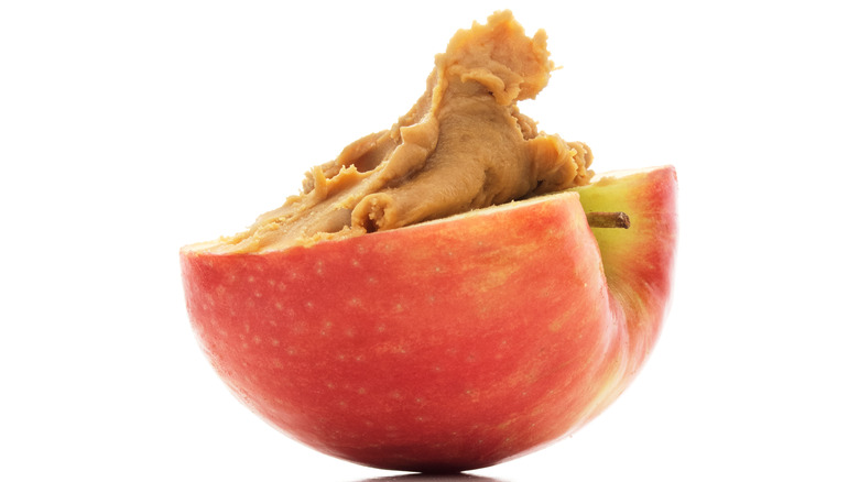 An apple with peanut butter