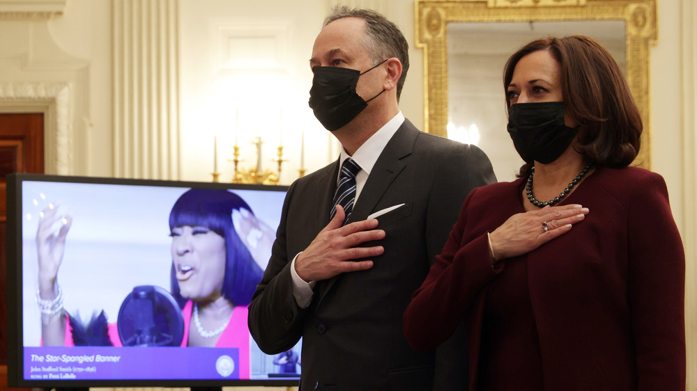 Kamala Harris and Doug Emhoff during national anthem