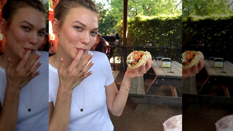 Karlie Kloss eating a vegetarian taco