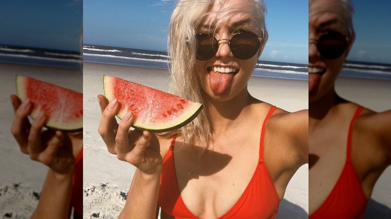 Karlie Kloss eating watermelon