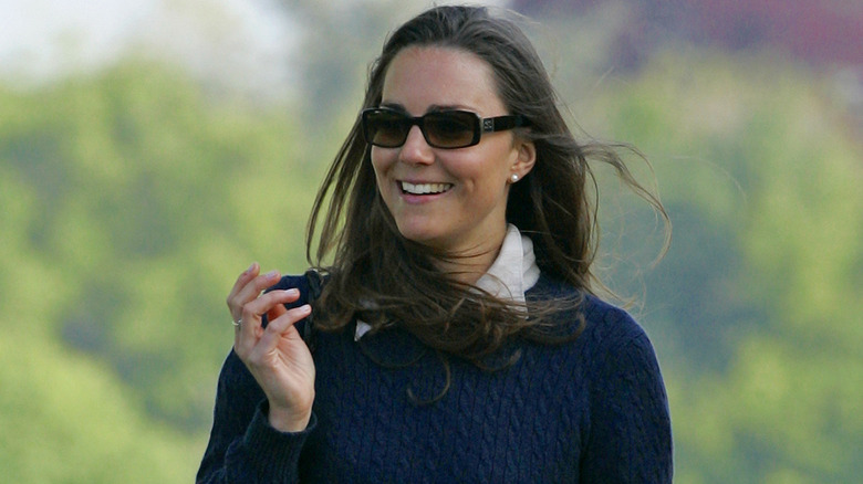 Young Kate Middleton wearing sunglasses