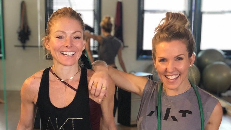 Kelly Ripa smiling with her personal trainer Anna Kaiser