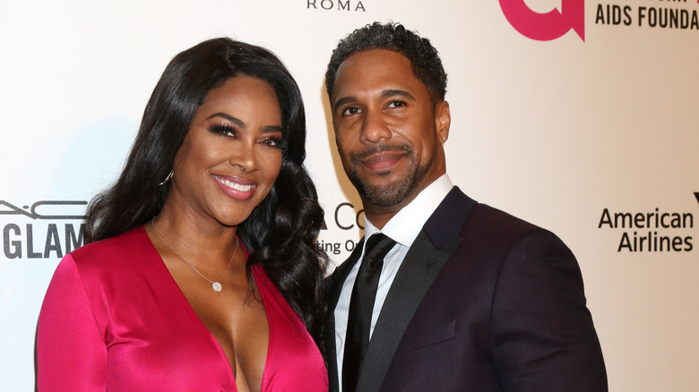 Kenya Moore and Marc Daly at an event