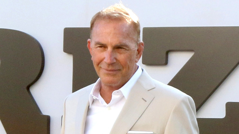 Kevin Costner poses on the red carpet