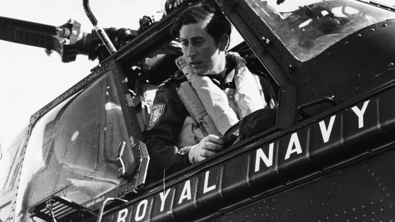 A young King Charles III in a helicopter 