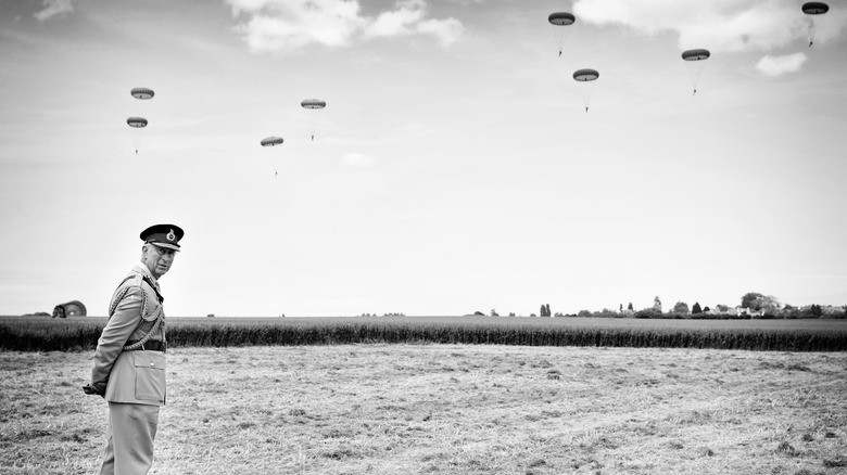 King Charles III watching parachutes 