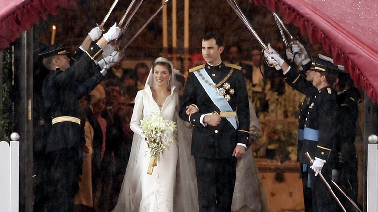 Queen Letizia and King Felipe walking