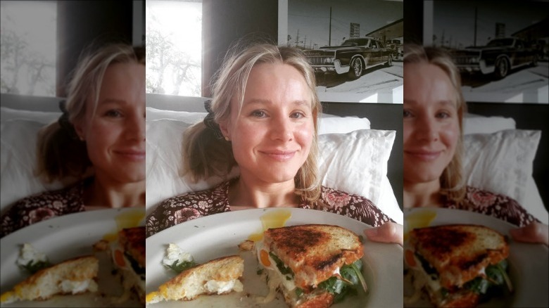 Kristen Bell eating breakfast in bed