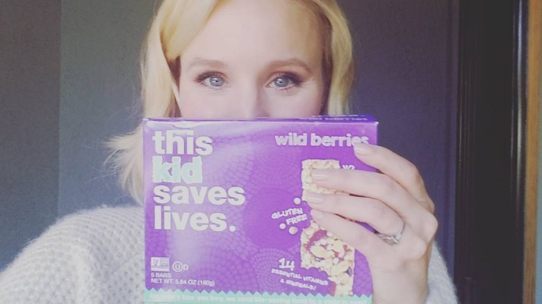 Kristen Bell with a box of bars