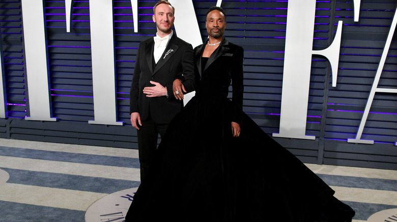 Adam Smith Billy Porter posing at Oscars party