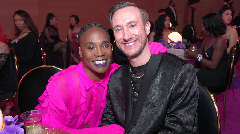 Billy Porter and Adam Smith smiling at event