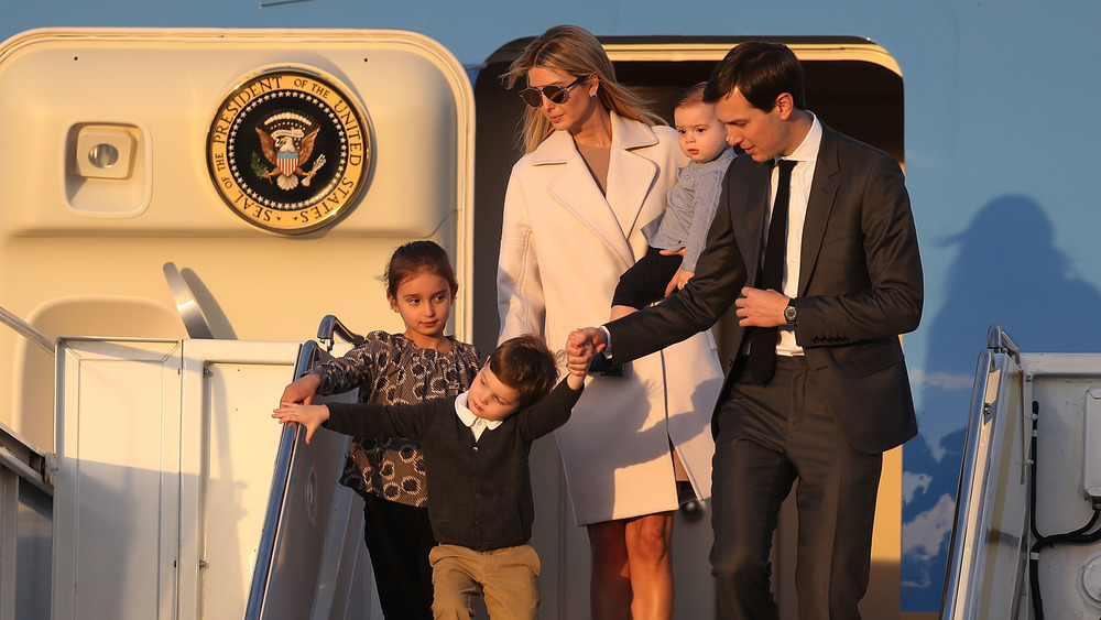 Ivanka Trump and her family exiting a plane