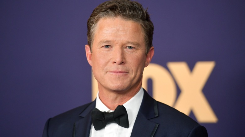 Billy Bush in a blue suit