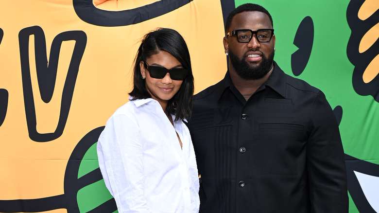 Chanel Iman and Davon Godchaux attend an event