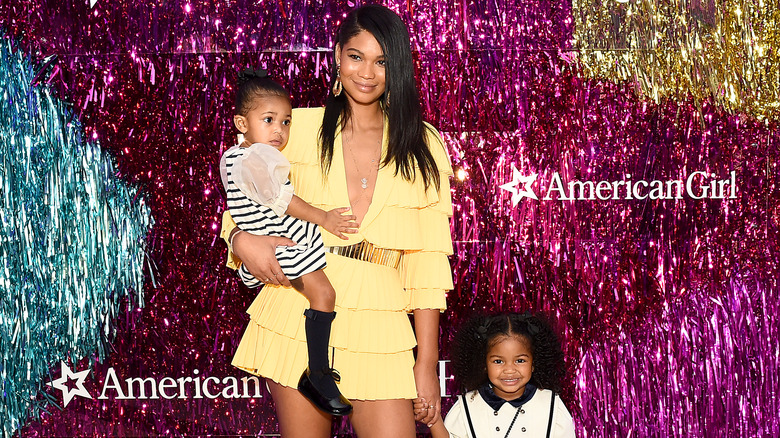 Chanel Iman poses with her two daughters