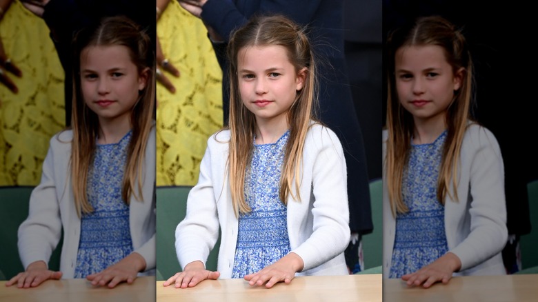 Princess Charlotte standing in bleachers