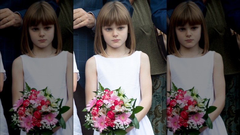 Princess Gabriella holding flowers