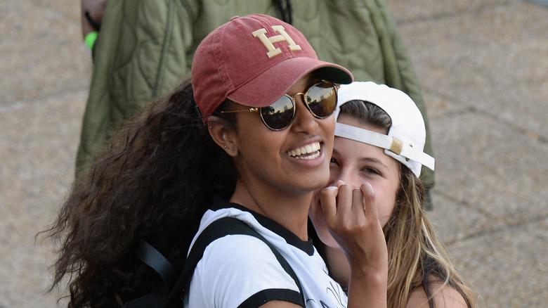 Malia Obama smiling with friend