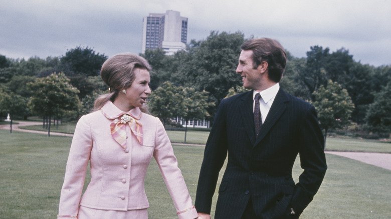 Anne and Mark holding hands 