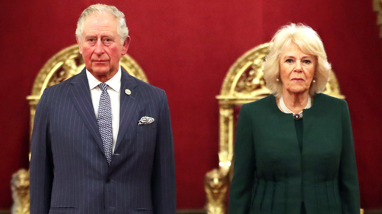 King Charles III and Camilla, Queen Consort posing 