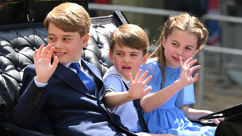 Prince George, Prince Louis, and Princess Charlotte waving