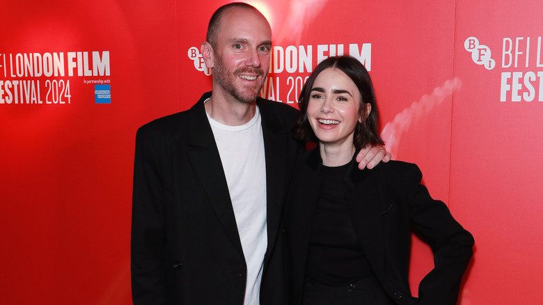 Charlie McDowell arm around Lily Collins