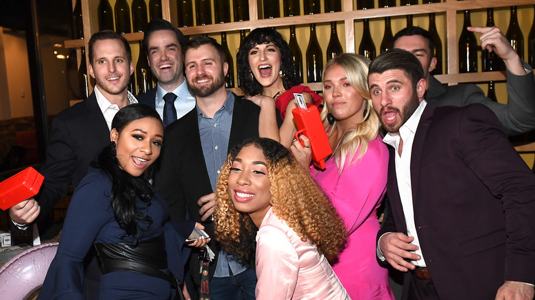 "Love Is Blind" cast members posing at reunion event