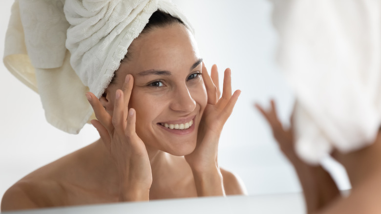 woman satisfied with beauty treatment