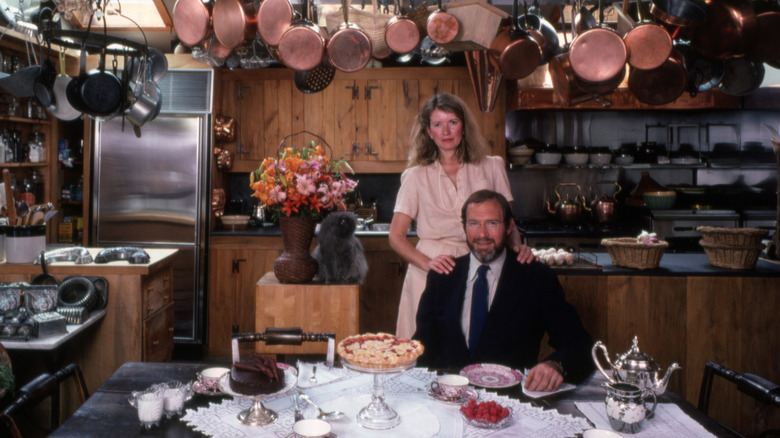 Martha and Andrew Stewart posing in their kitchen