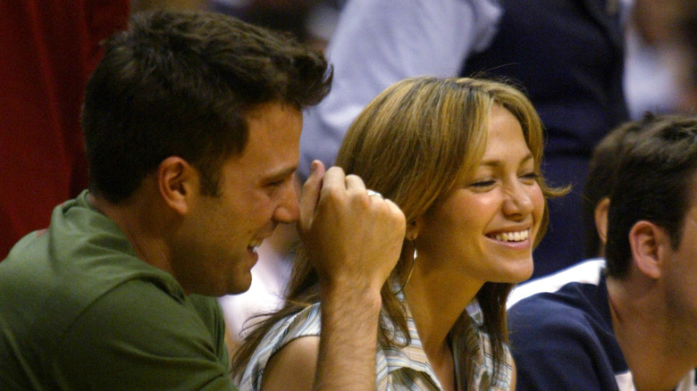 Ben Affleck and Jennifer Lopez attend a basketball game during their initial early aughts romance