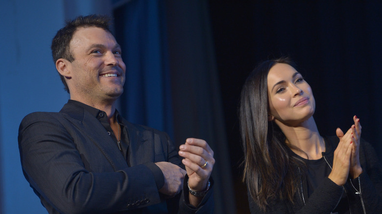 Megan Fox and Brian Austin Green clapping