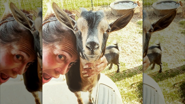 Stephanie Grisham with a goat