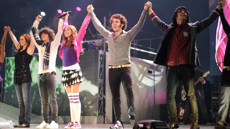 Miley Cyrus and the Jonas Brothers onstage