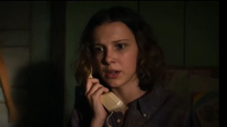 Millie Bobby Brown talking on phone in Stranger Things 