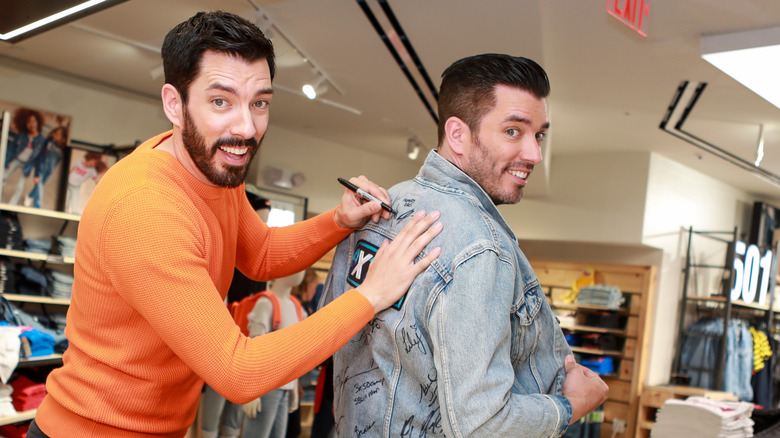 Jonathan and Drew Scott smile for the camera