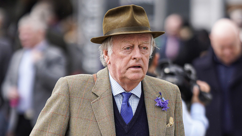 Andrew Parker Bowles wearing a brown hat
