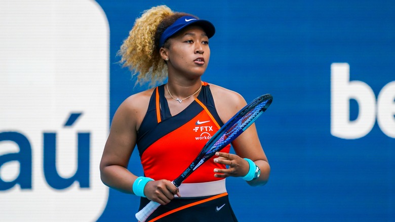 Naomi Osaka playing tennis 