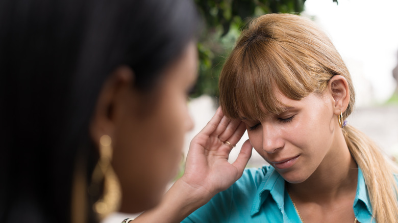 women distressed during conversation