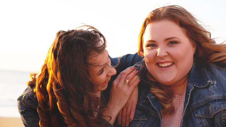 two friends smiling