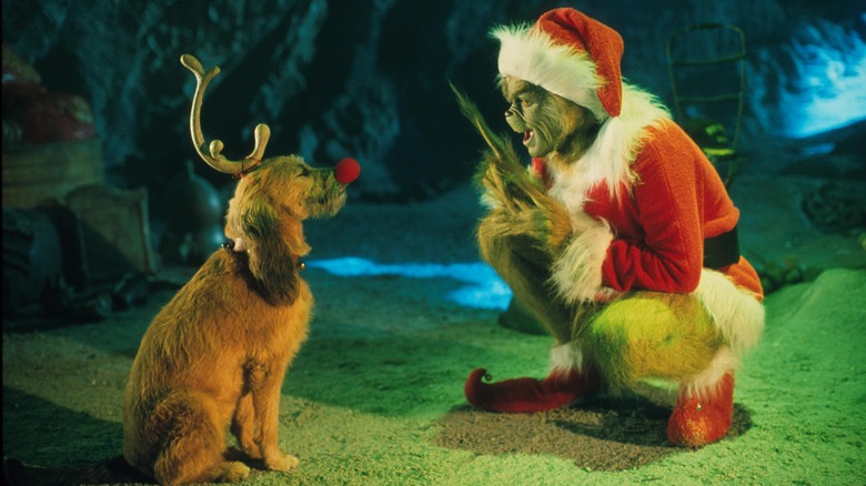 A still image of the Grinch and Max