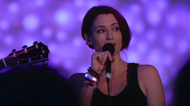 Chyler Leigh singing on stage